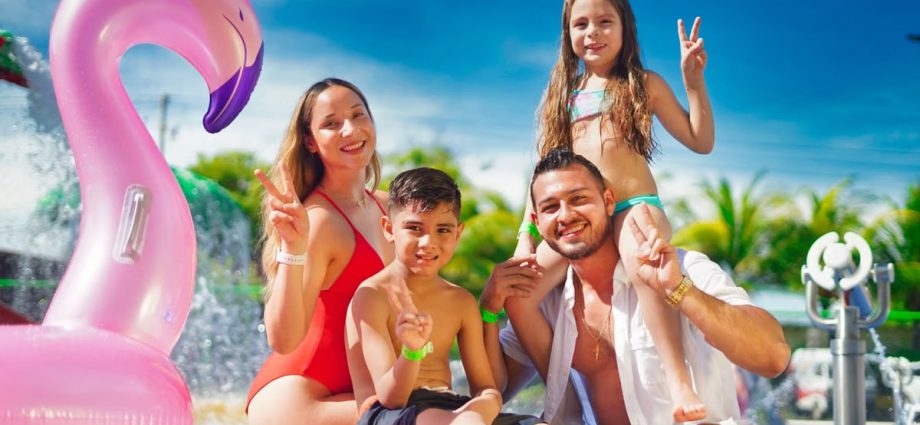 Family enjoying a sunny day by the pool with a pink flamingo float, creating joyful memories.